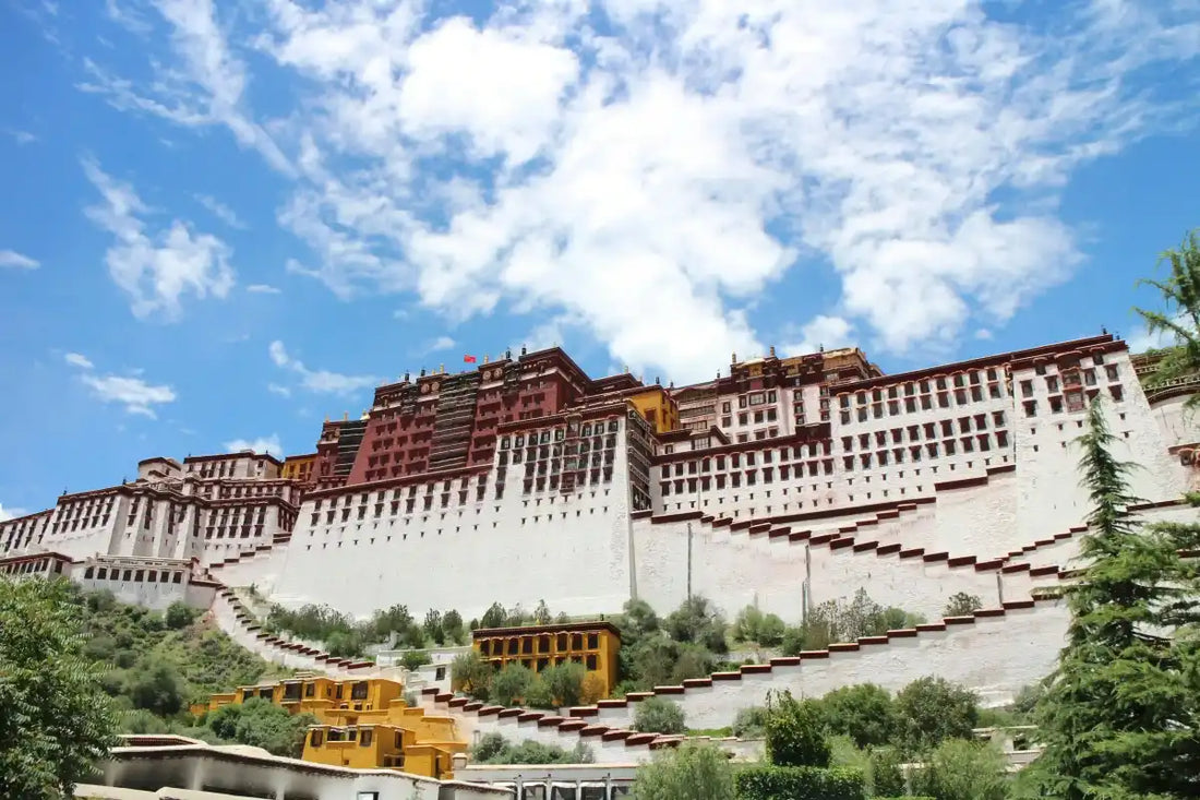 Potala Palace in Lhasa, Tibet, blue sky with white clouds, classic landmark view