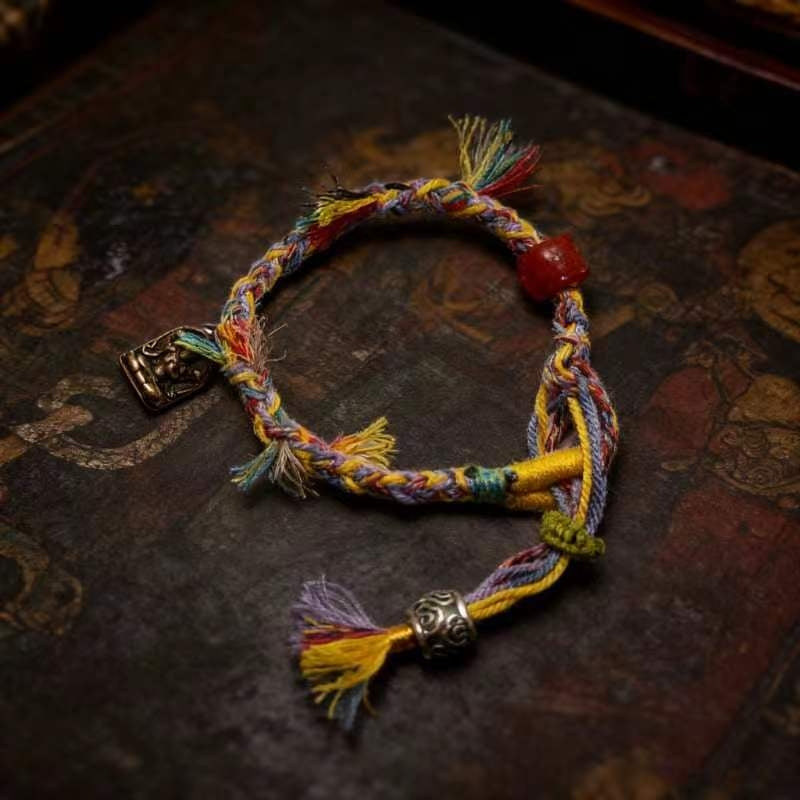 Artisans weave amulet bracelets