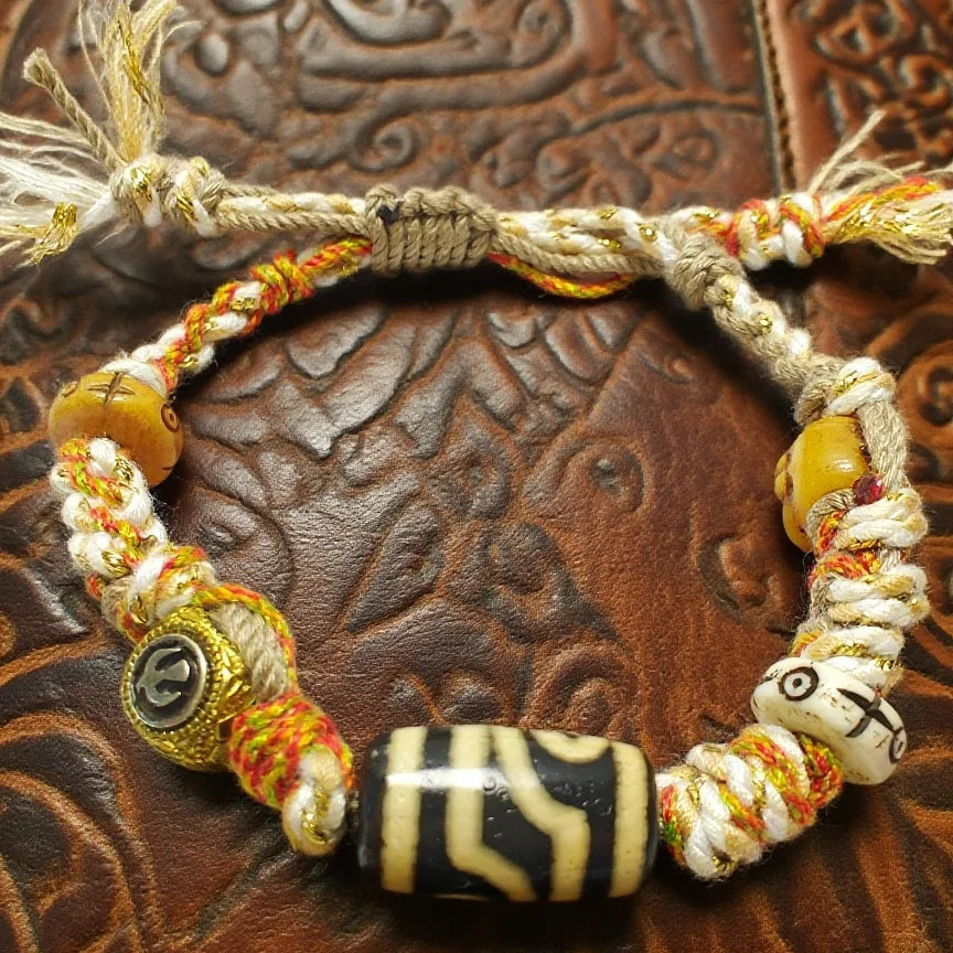 Tibetan Dzi Bead Bracelet: Balance chakras and stand out, each wear showcases wisdom and vitality.
