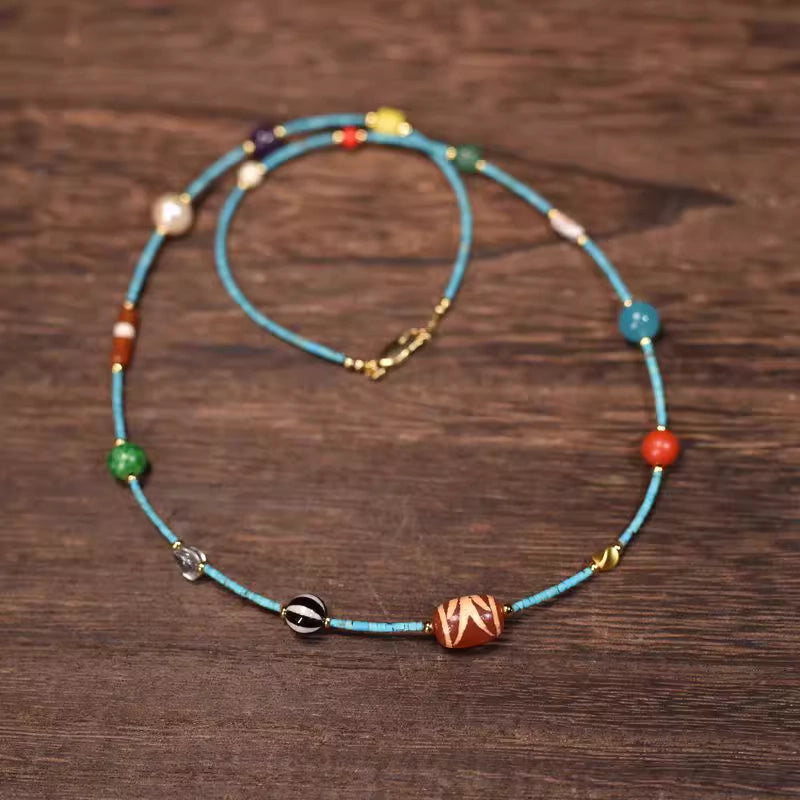 Dzi Bead Multi-Gem Magnesite Triple-Layer Choker Bracelet: Crafted with authentic dzi beads, vibrant magnesite, and assorted gemstones with exquisite craftsmanship.