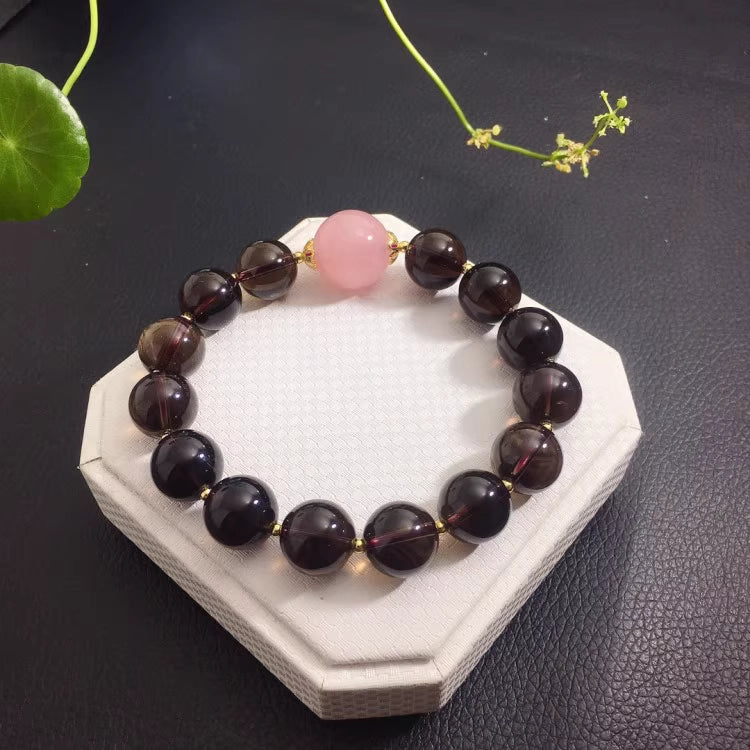  This natural smoky quartz bracelet is a sleek choice—add a touch of earthy sophistication to your look and embrace its calming, grounding vibes.