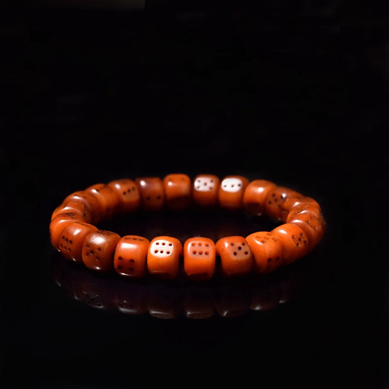 Vintage Ox Bone Dice Bracelet: A Unique Statement Piece for Boho and Retro Enthusiasts.