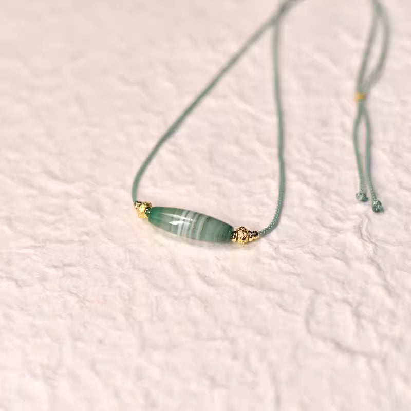 Dzi beads embody the spiritual connotations of Tibetan culture. Named "Spiritual Journey", this necklace conveys the meaning of inner exploration and spiritual pursuit.