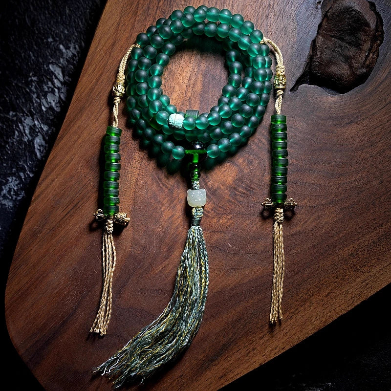 Green Tara Glass Tibetan Prayer Bead Bracelet—108 Beads, Sacred Elegance.