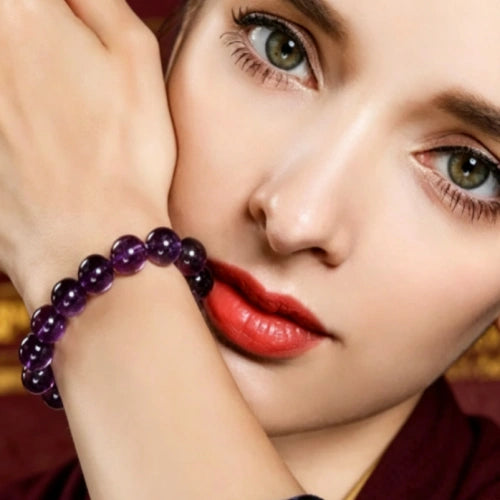 Model wearing natural amethyst bead bracelet, Tibetan spiritual healing crystal jewelry for daily energy protection.