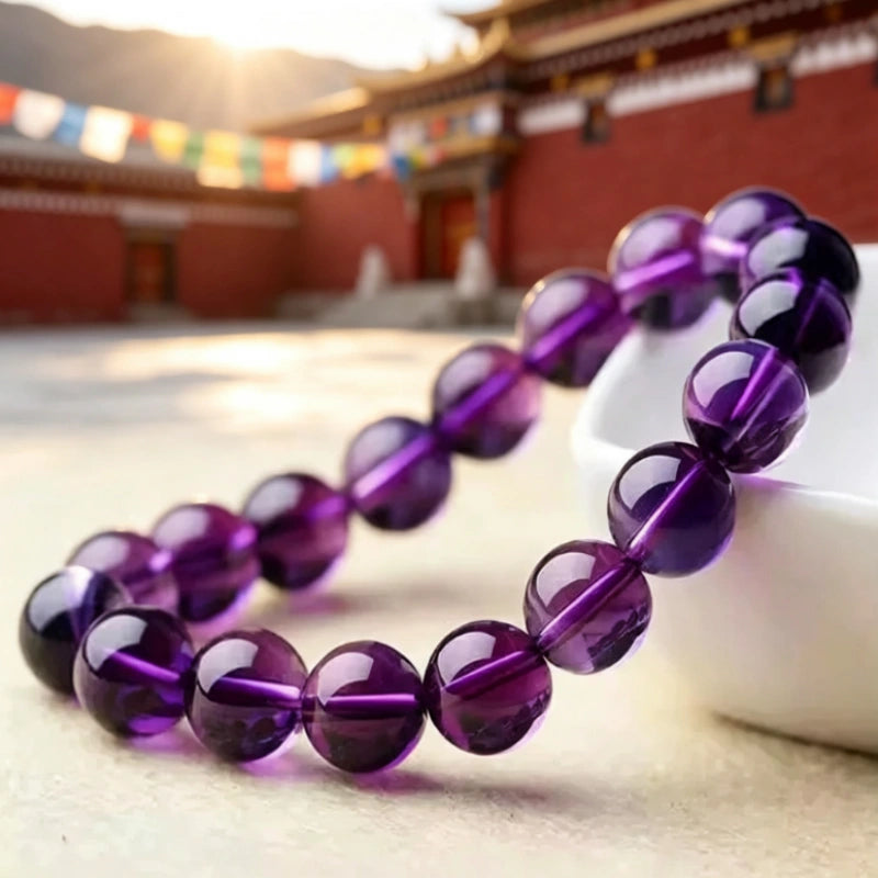 Natural amethyst prayer bracelet, handmade Tibetan spiritual healing jewelry with sacred temple energy.