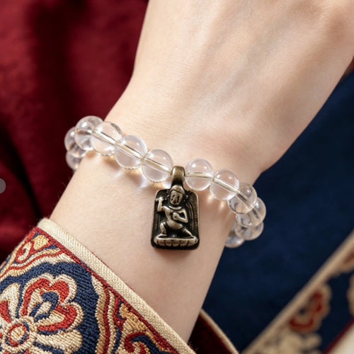 Clear quartz Tibetan Buddhist bracelet worn on wrist for protection and calm