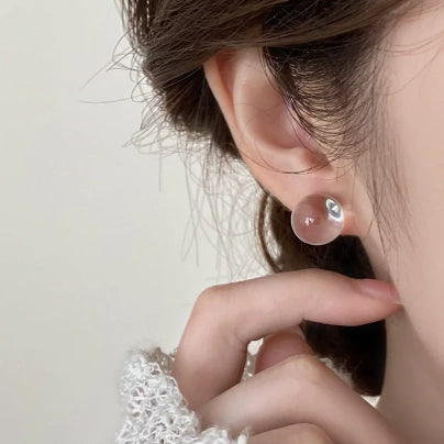 natural clear quartz drop silver earrings model wearing shot
