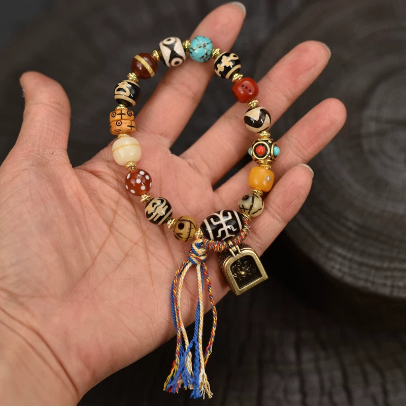 Dzi Bead Yak Bone Bracelet with Tibetan Gau Box Charm Worn on Hand
