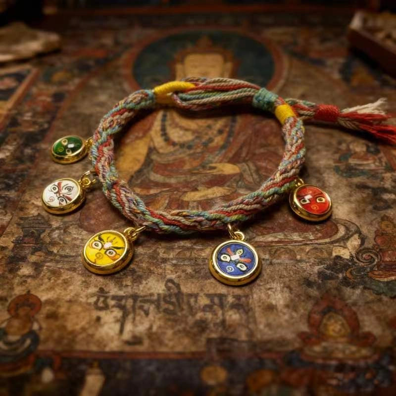 A person wearing the adjustable Tibetan protection bracelet on their left wrist for mindfulness and attracting prosperity.