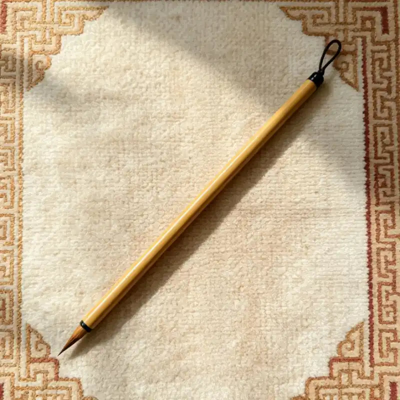 Weasel hair thangka liner brush with plastic handle, full length view