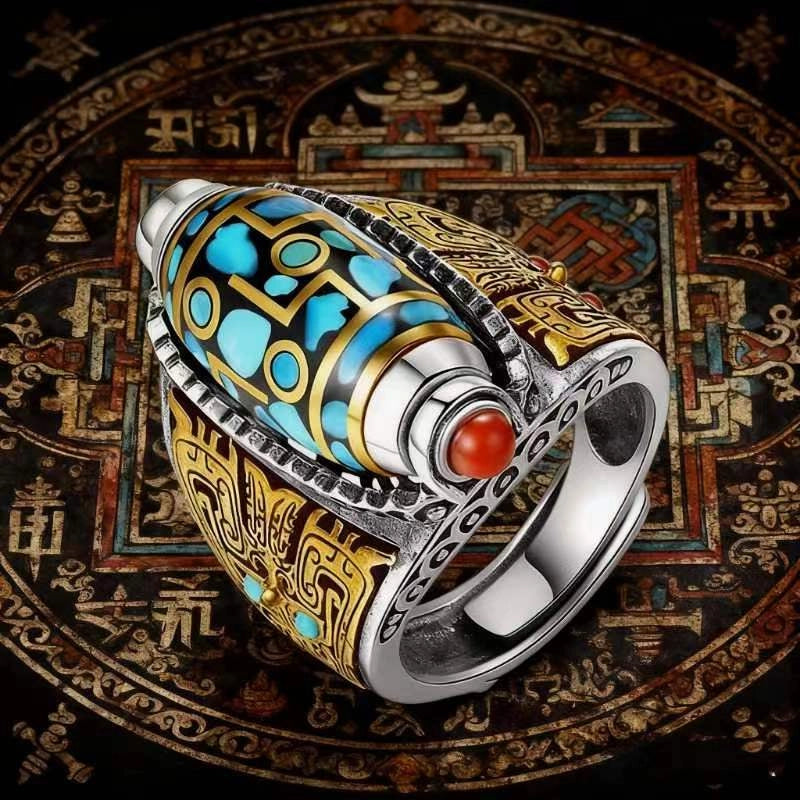 Vintage Tibetan rotatable dzi bead silver ring inlaid turquoise and ruby, traditional Tibetan ornament studio shot