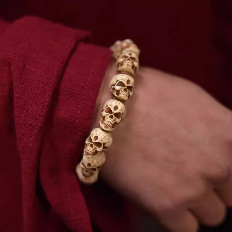 Men's single loop Tibetan yak bone bracelet with hand carved Citipati skull spiritual plateau jewelry
