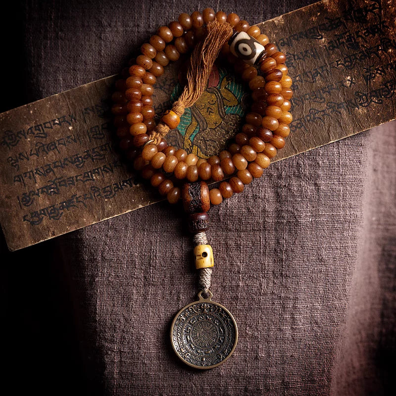 Macro closeup of natural grain on aged Tibetan yak bone prayer beads